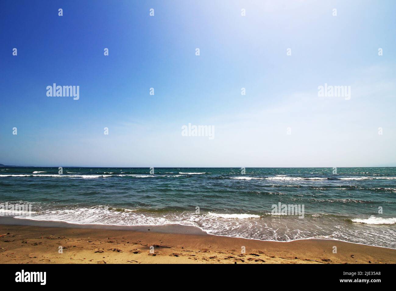 Closeup photo of the shore of the waves at Shonan Beach Stock Photo