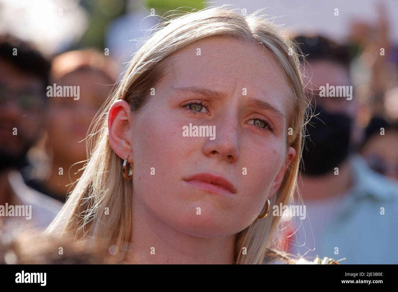An abortion rights demonstrator reacts as she protests outside the United States Supreme Court as the court rules in the Dobbs v Women's Health Organization abortion case, overturning the landmark Roe v Wade abortion decision in Washington, U.S., June 24, 2022. REUTERS/Jim Bourg Stock Photo