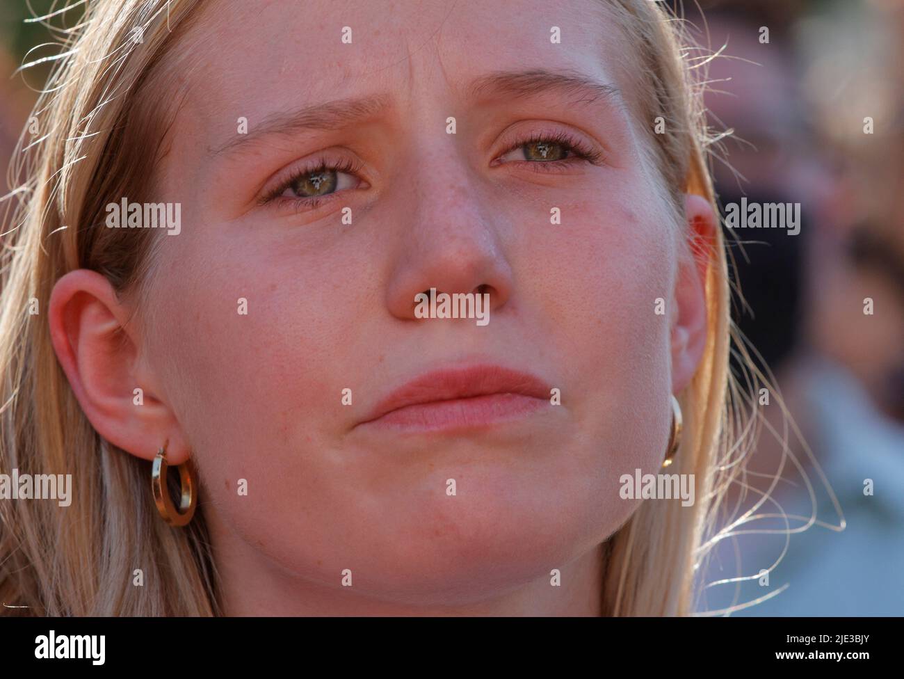 An abortion rights demonstrator reacts as she protests outside the United States Supreme Court as the court rules in the Dobbs v Women's Health Organization abortion case, overturning the landmark Roe v Wade abortion decision in Washington, U.S., June 24, 2022. REUTERS/Jim Bourg Stock Photo