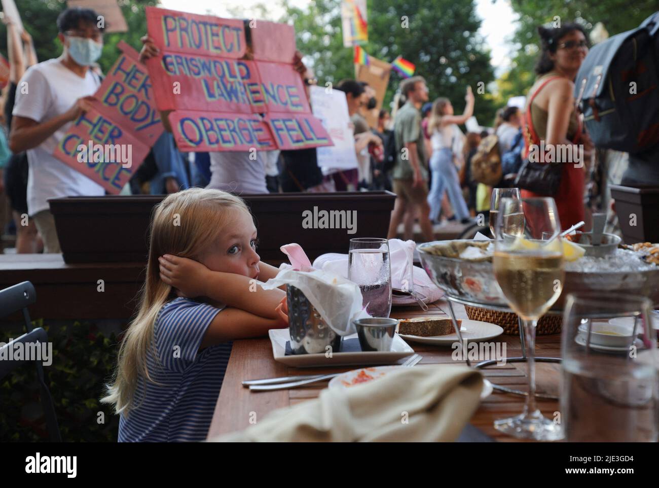 A child reacts as abortion rights protesters demonstrate after the U.S. Supreme Court ruled in the Dobbs v Women’s Health Organization abortion case, overturning the landmark Roe v Wade abortion decision in Boston, Massachusetts, U.S., June 24, 2022. REUTERS/Brian Snyder Stock Photo