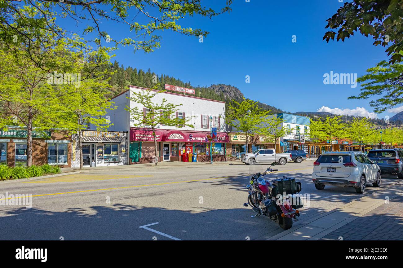 Peachland BC, Canada touristic place for summer vacation. Street view of a main lakeside road in the town. Centennial Way 1909-2009. Travel photo, nob Stock Photo