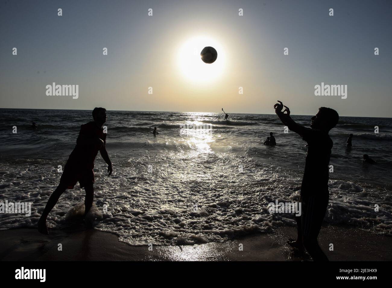 Gaza, Gaza. 24th June, 2022. Palestinians play with a football on the beach on a hot day in Gaza City on Friday, June 24, 2022. Photo by Ismael Mohamad/UPI Credit: UPI/Alamy Live News Stock Photo