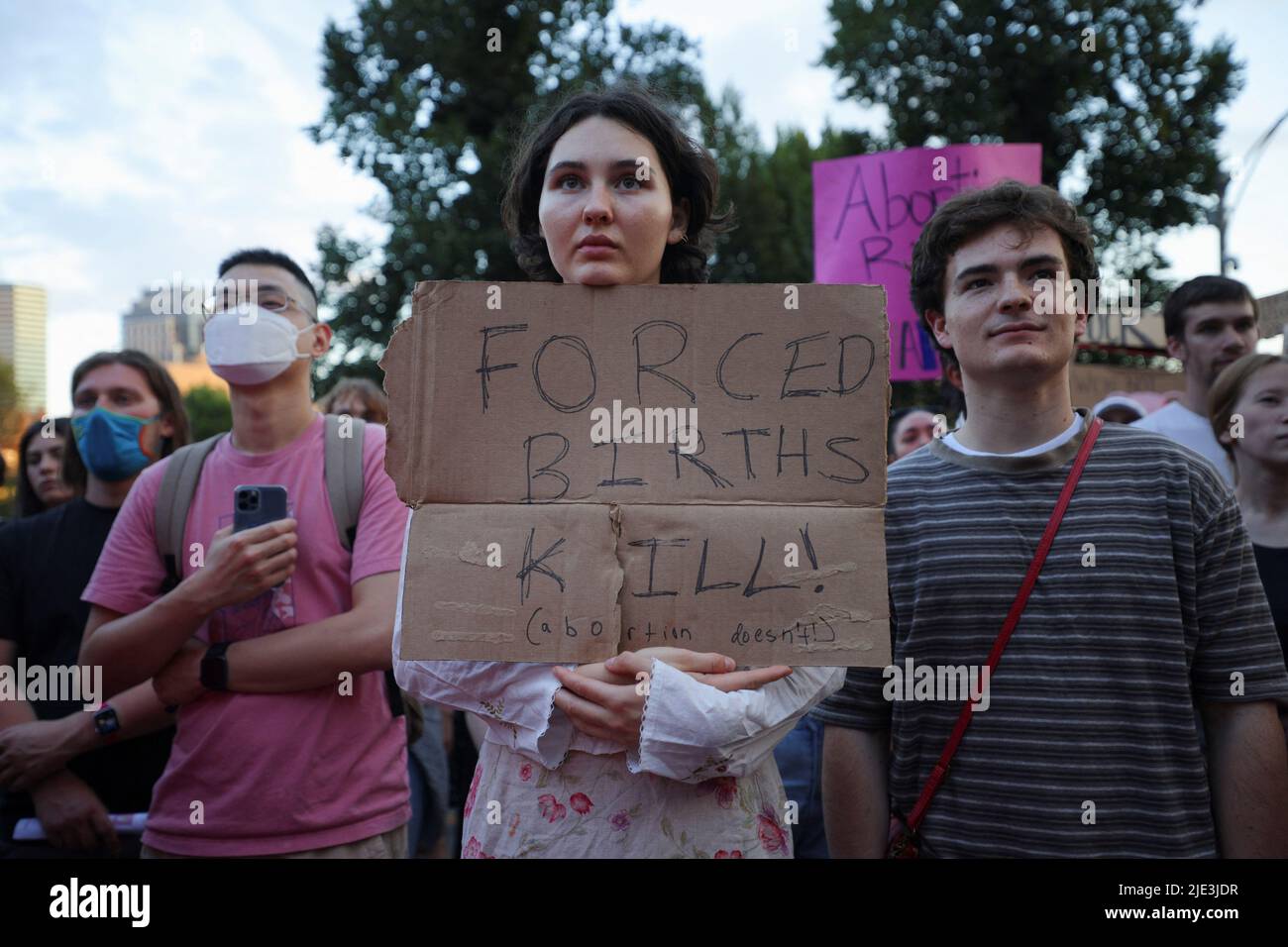 An abortion rights protester holds a sign as she demonstrates after the U.S. Supreme Court ruled in the Dobbs v Women’s Health Organization abortion case, overturning the landmark Roe v Wade abortion decision in Boston, Massachusetts, U.S., June 24, 2022. REUTERS/Brian Snyder Stock Photo