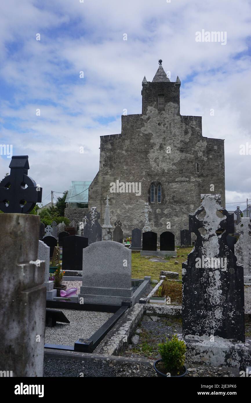 Kilfenora, Co. Clare, Ireland: Kilfenora Cathedral contains some of Ireland’s high crosses. A modern glass roof protects them from the elements. Stock Photo