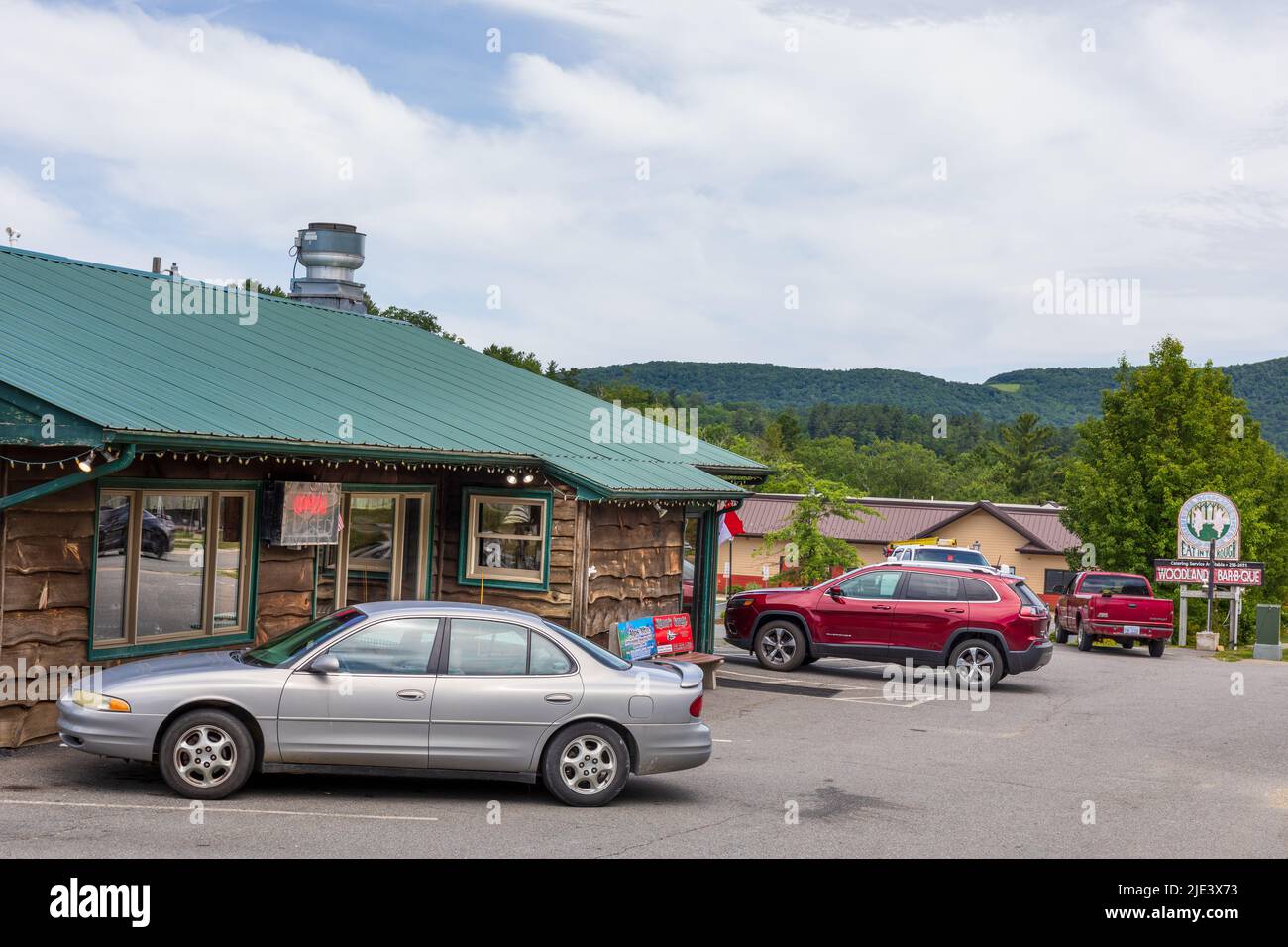 BLOWING ROCK, NC, USA-20 JUNE 2022: Woodland's Bar-B-Que on US 321 in Blowing Rock. Building and sign. Stock Photo