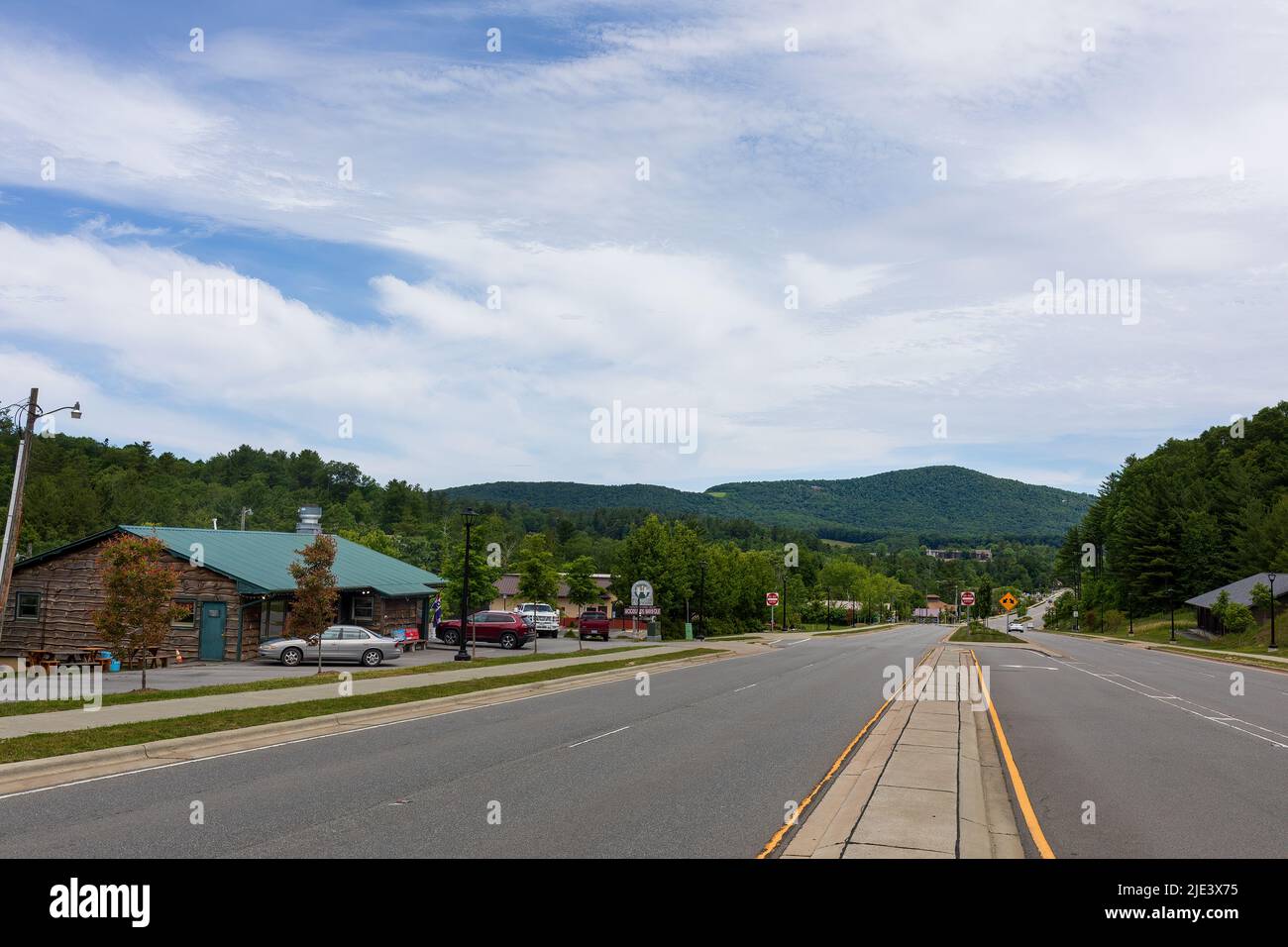 BLOWING ROCK, NC, USA-20 JUNE 2022:  Panoramic view of US 321 in Blowing Rock, showing Blue Ridge Mountains and local businesses. Stock Photo