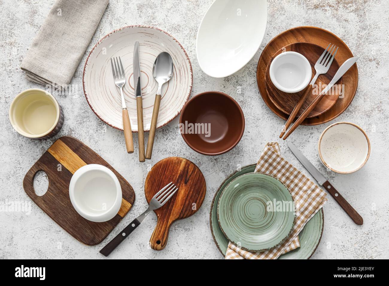 Clean table setting on light background Stock Photo - Alamy