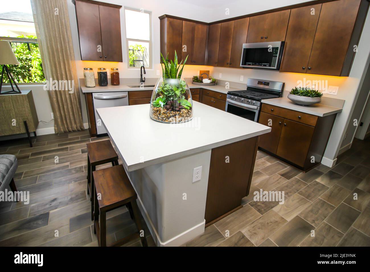 Kitchen Island Counter Top With Large Glass Vase Stock Photo Alamy