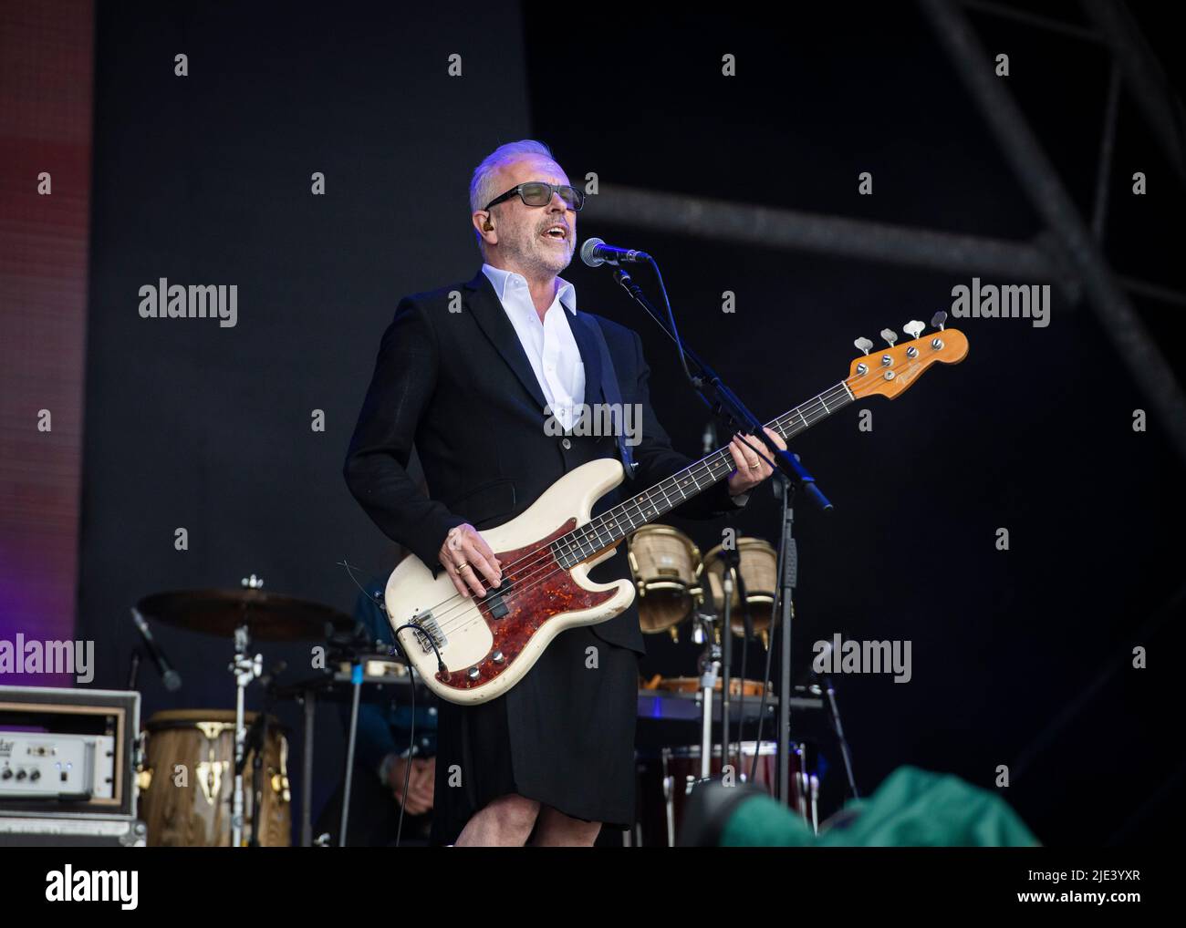 Glastonbury, UK. 24th June 2022. Nick Seymour from Crowded House performs on the Pyramid Stage at Glastonbury Festival, at Worthy Farm in Somerset. Picture date: Friday June 24, 2022. Photo credit should read: David Jensen/Empics/Alamy Live News Stock Photo