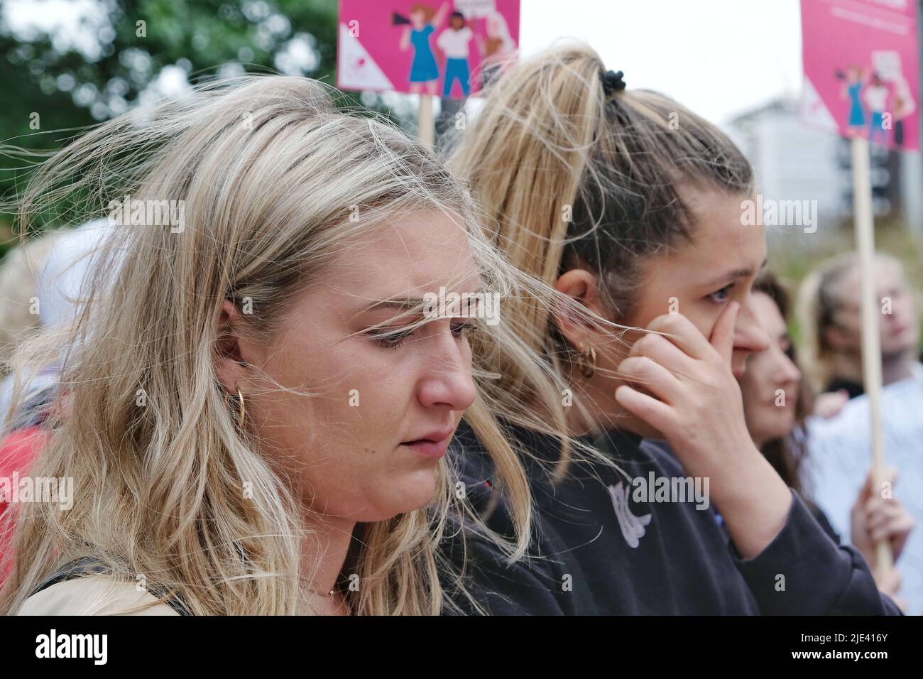 London, UK, 24th June, 2022. A woman sheds a tear as around 100-150 campaigners and supporters gathered to protest outside the American embassy in Vauxhall following the U.S. Supreme Court's decision to end the constitutional right to abortion - in place for almost 50 years following the 1973 Roe v Wade ruling.  Individual states will decide how to proceed, with thirteen automatically banning the medical procedure outright as trigger laws took effect. Credit: Eleventh Hour Photography/Alamy Live News Stock Photo