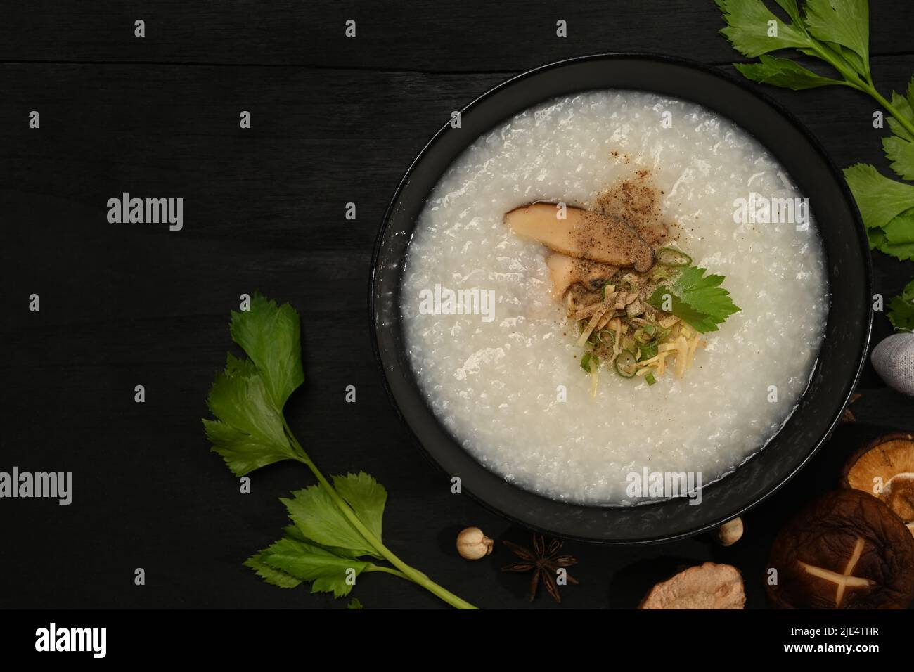 Rice porridge, rice gruel or congee with shiitake mushroom, slice