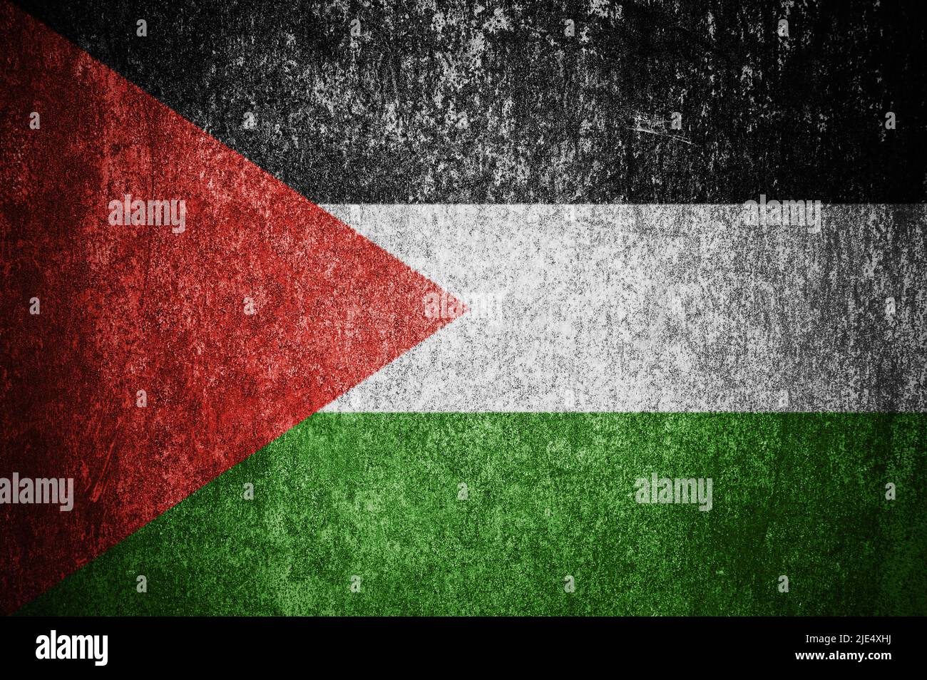 Closeup of grunge Palestinian flag. Dirty Palestine flag on a metal surface. Stock Photo