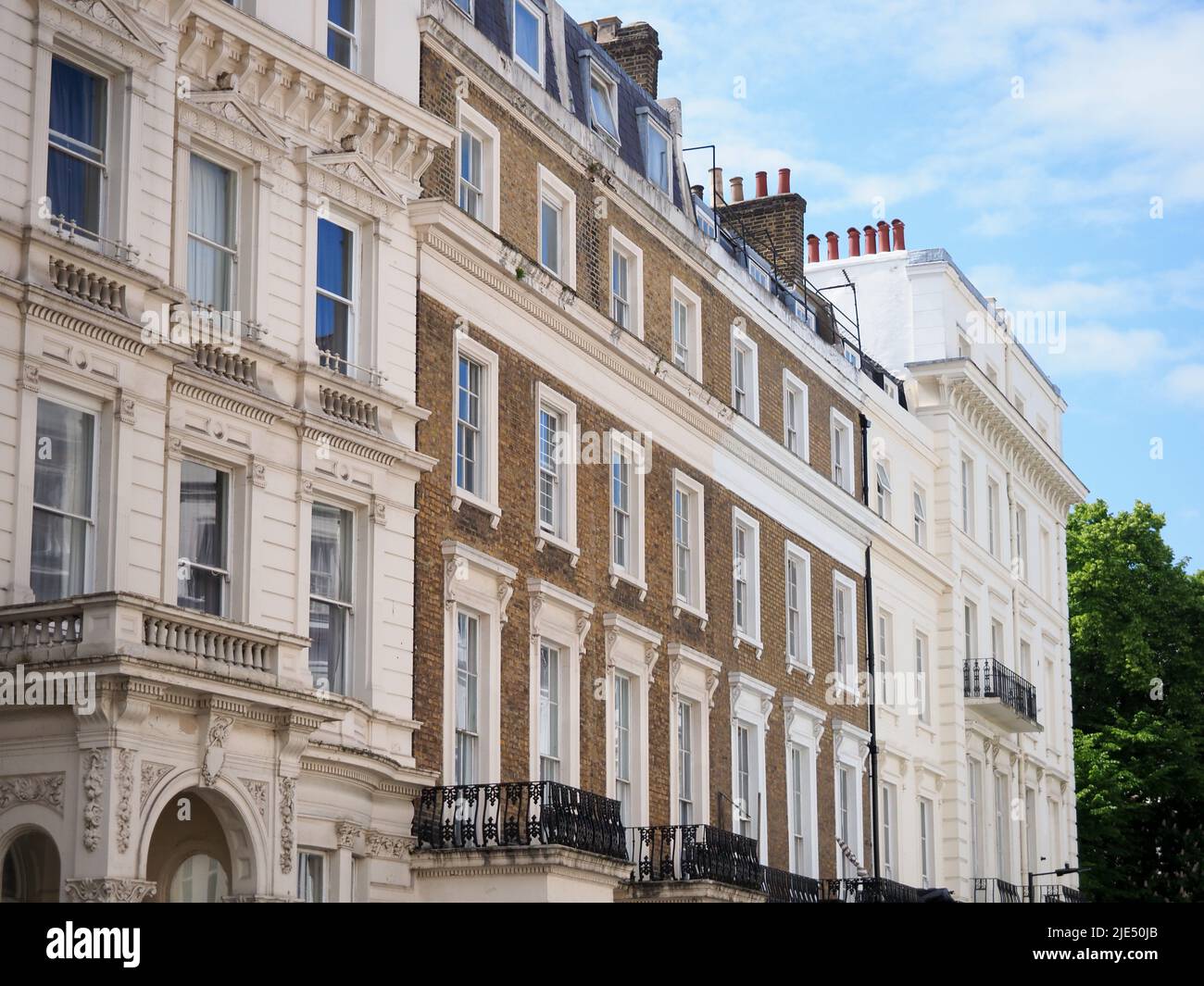 Details of a terrace of elegant and historic buildings in central London Stock Photo