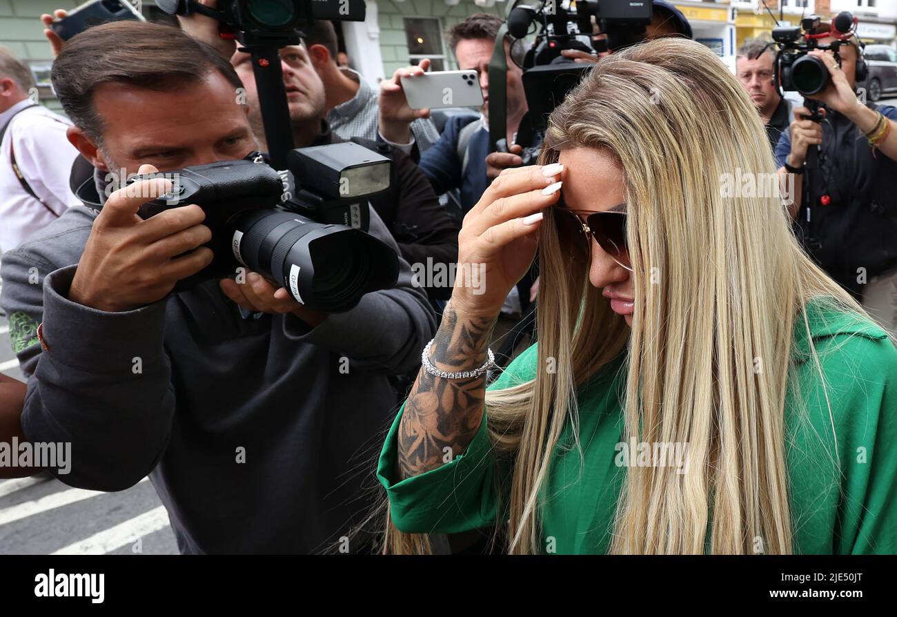 Lewes, UK 24th June 2022 : Reality TV star and former glamour model Katie Price and  fiancé Carl Woods leaving Lewes Crown Court after being sentenced. Stock Photo