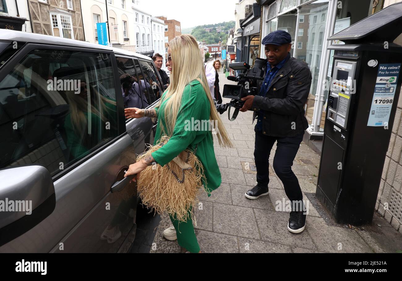 Lewes, UK 24th June 2022 : Reality TV star and former glamour model Katie Price and  fiancé Carl Woods leaving Lewes Crown Court after being sentenced. Stock Photo
