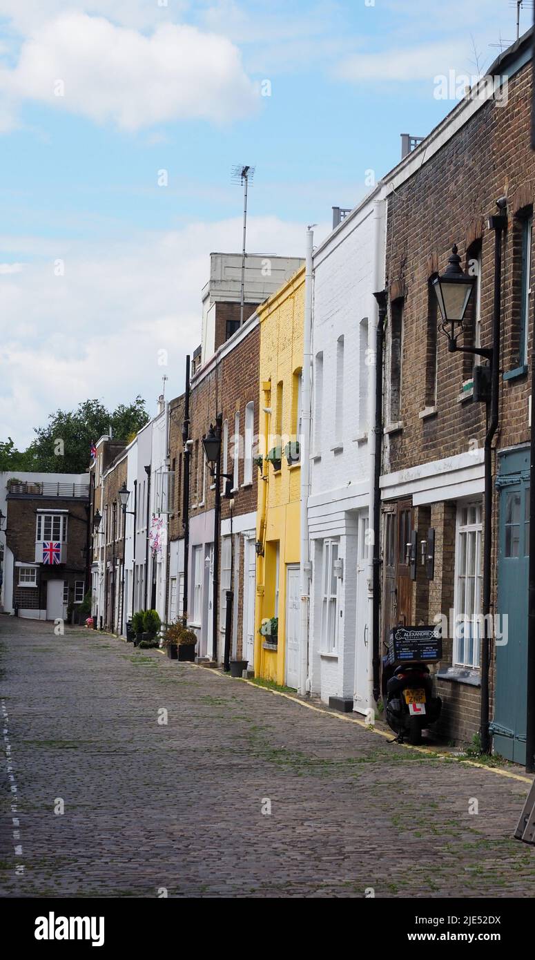 An historic mews of terraced housing in central London near Paddington Stock Photo