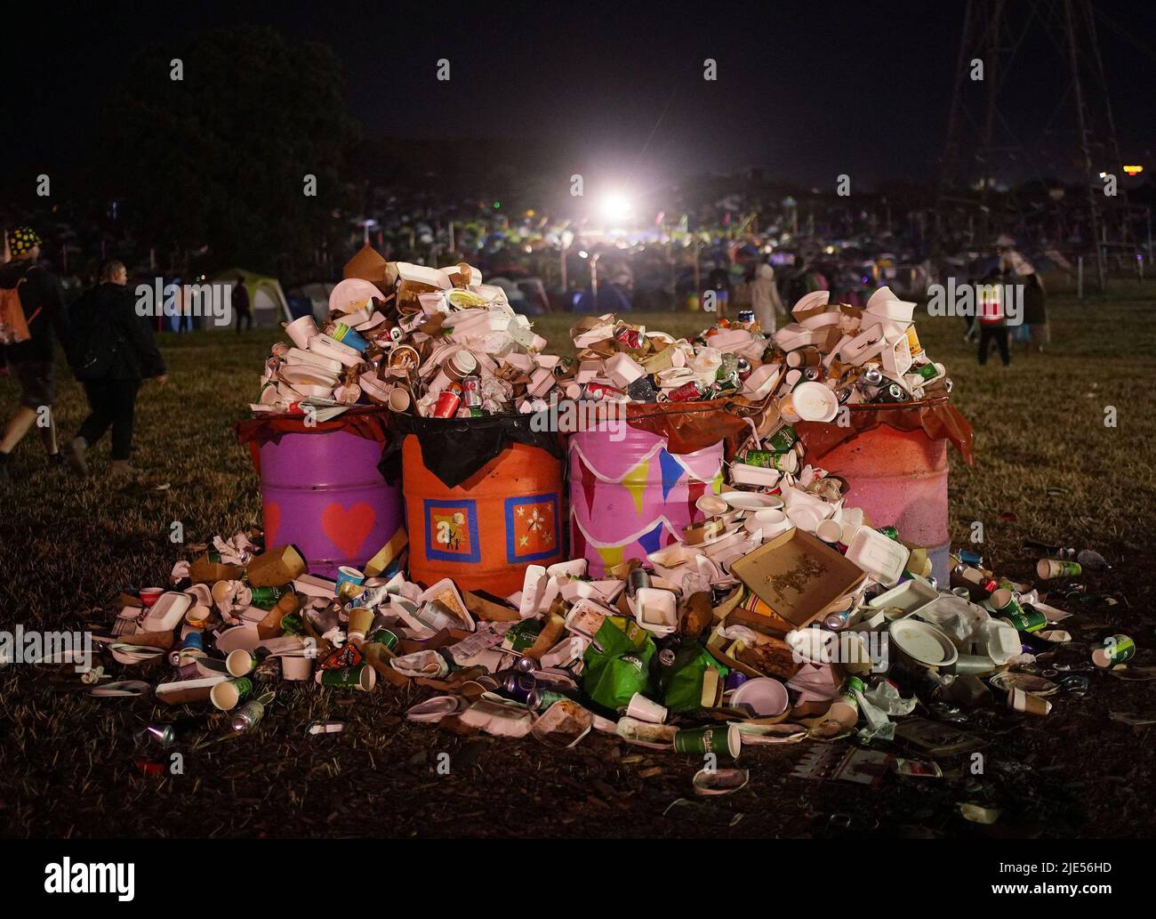Overflowing litter bins during the Glastonbury Festival at Worthy Farm