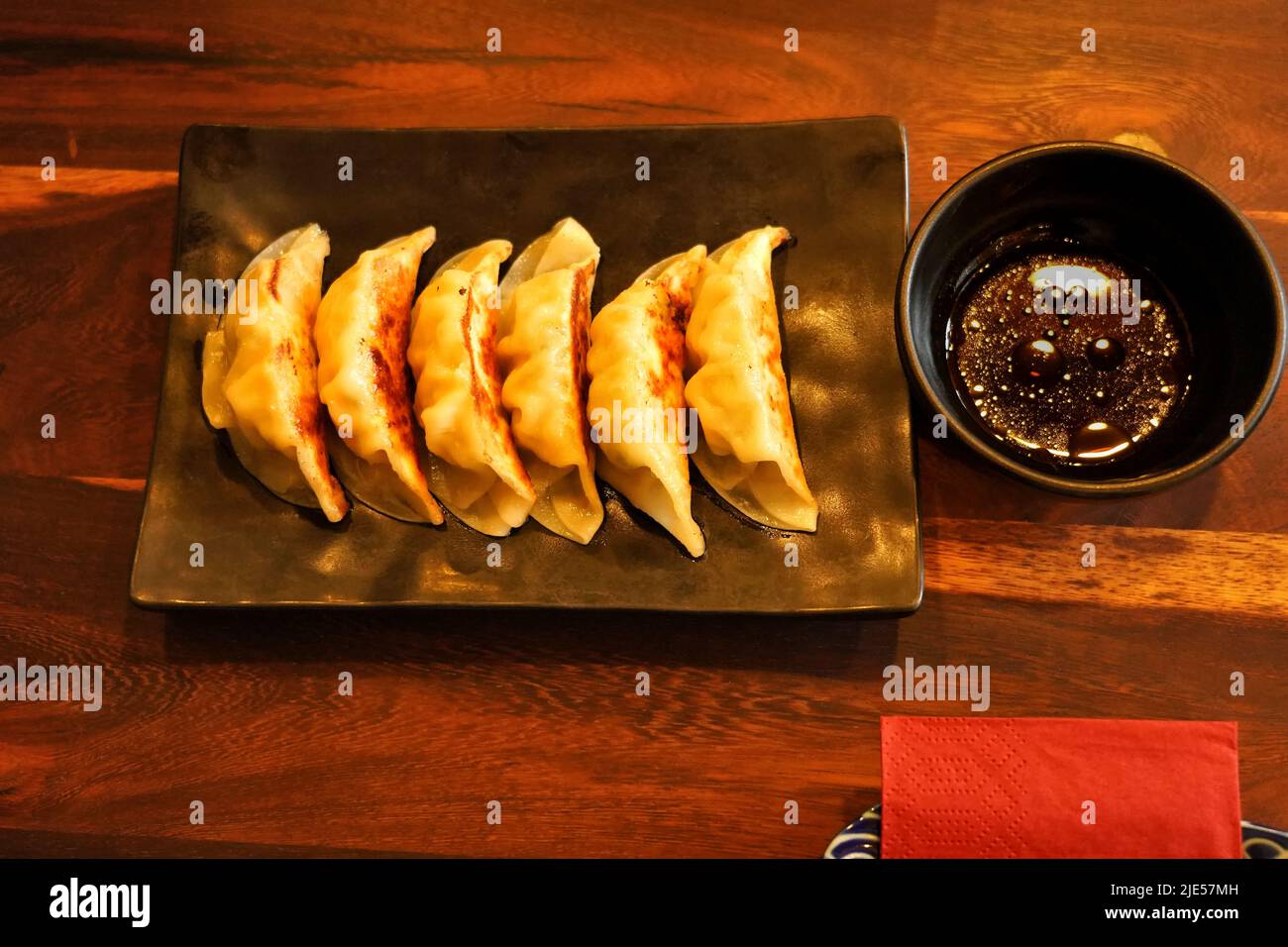 Close-up of Japanese gyoza in a restaurant in Düsseldorf/Germany. Gyoza are dumplings with various fillings, for example minced pork or vegetables. Stock Photo