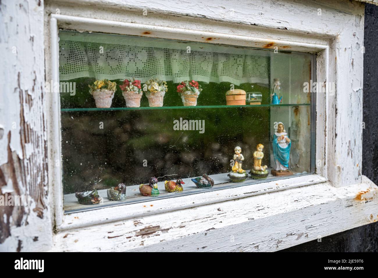 Objects on a window of a traditional house in Mykines Island, Faroe Islands Stock Photo