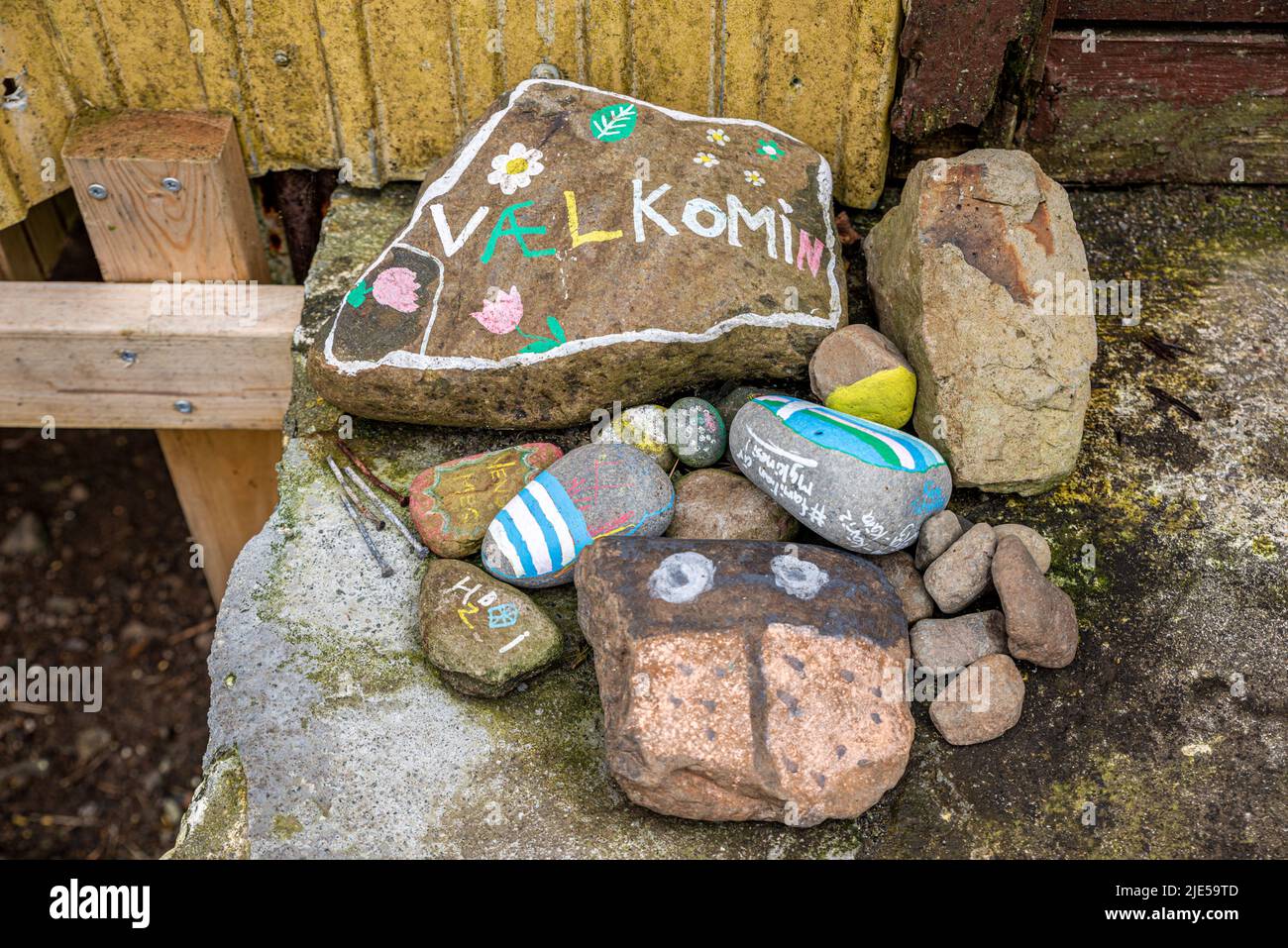 Painted welcoming stones, Mykines village, Mykines Island, Faroe Island Stock Photo