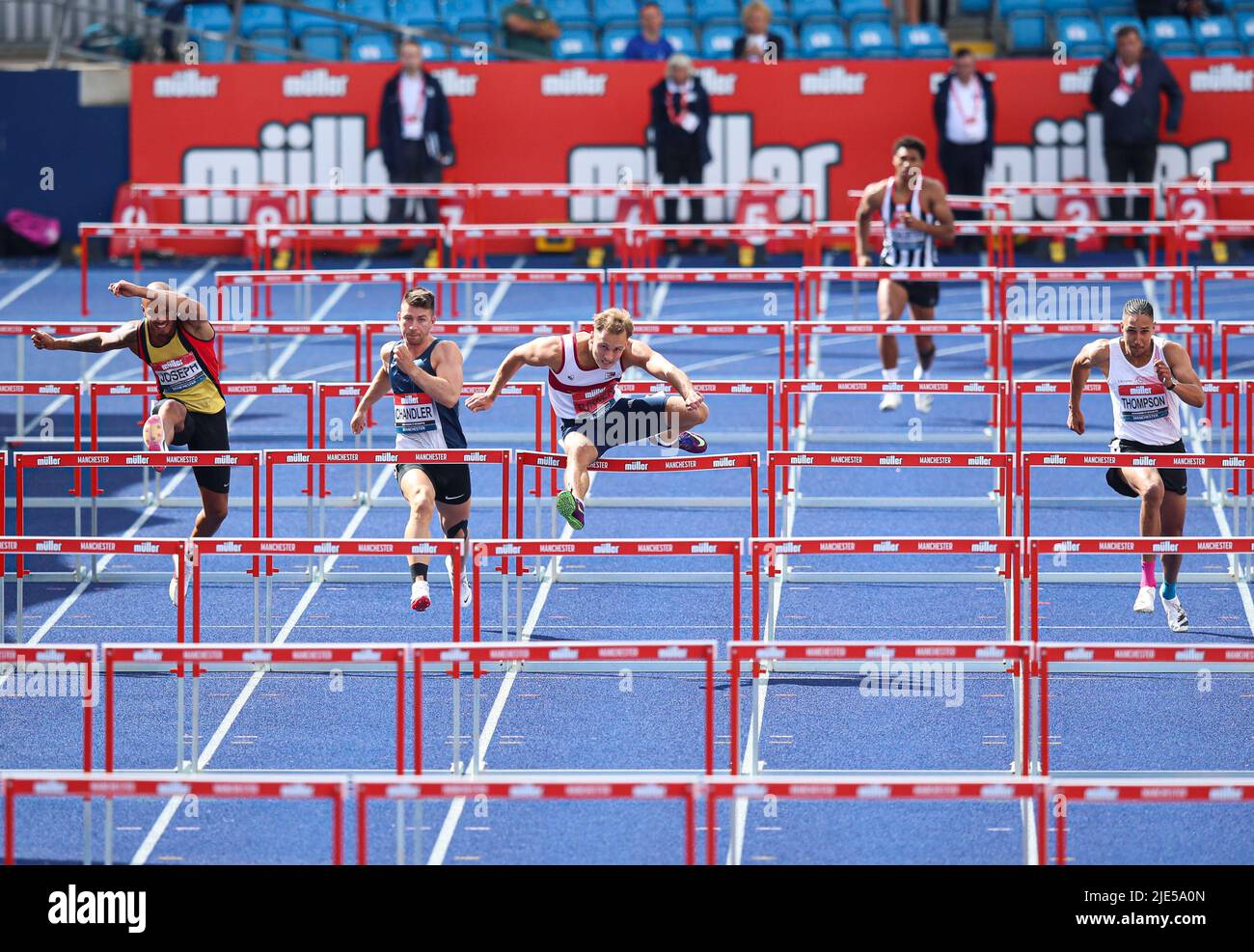 Jack Turner (centre) on his way winning the Men's 110m Hurdles