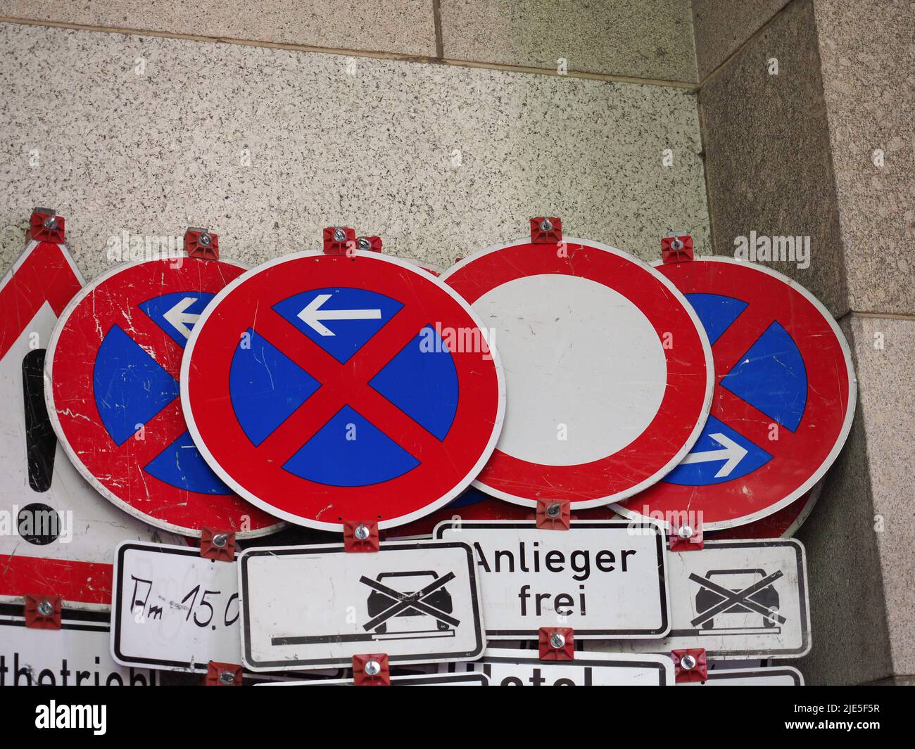 Many german signs including no parking and no stopping no way and