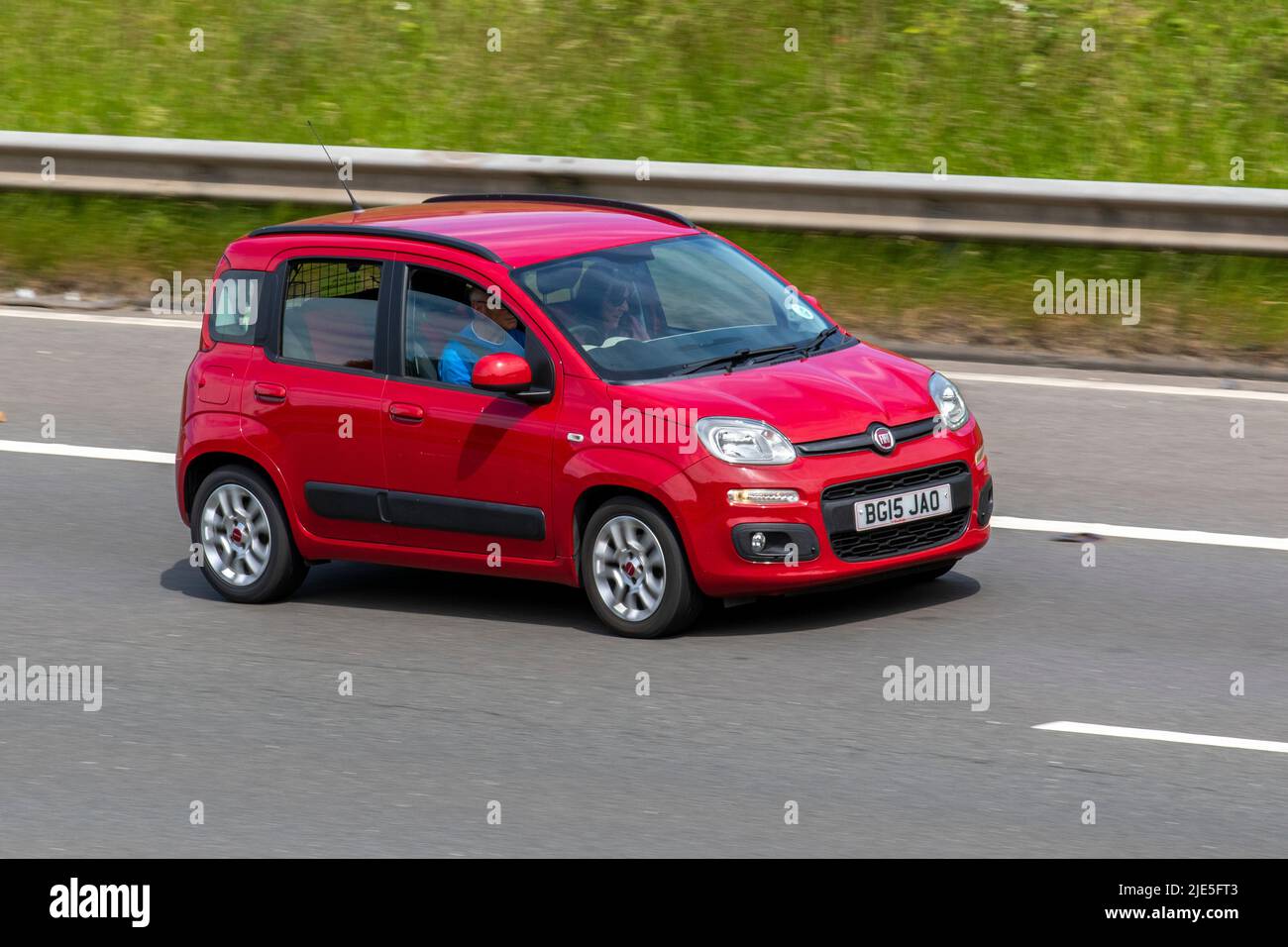 2015 (15) red FIAT PANDA POP 1242cc petrol small Italian city car;  traveling on the M6 motorway, UK Stock Photo
