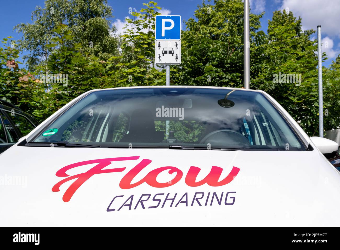 Flow carsharing SEAT Mii electric at parking for carsharing vehicles Stock Photo