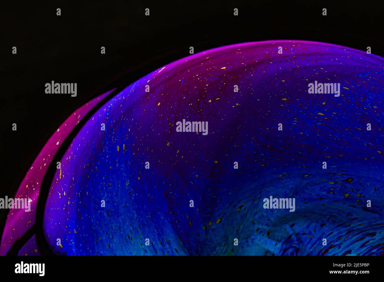 Beautiful psychedelic abstractions on the surface soap bubbles. Stock Photo