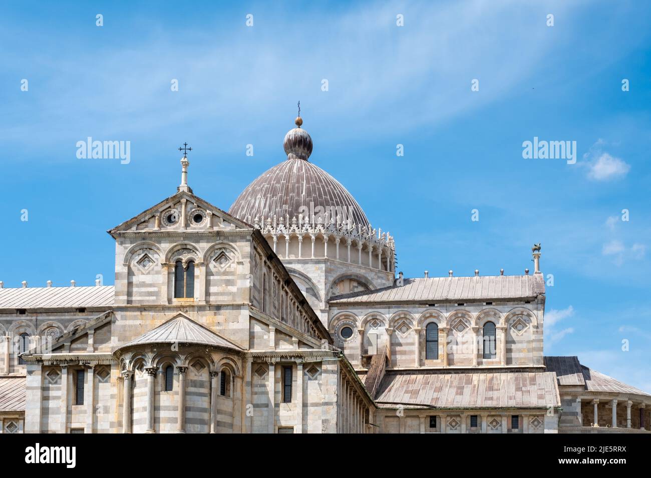Architectural details of the exterior of the Pisa Cathedral in Pisa, Italy with negative space for copy. Stock Photo