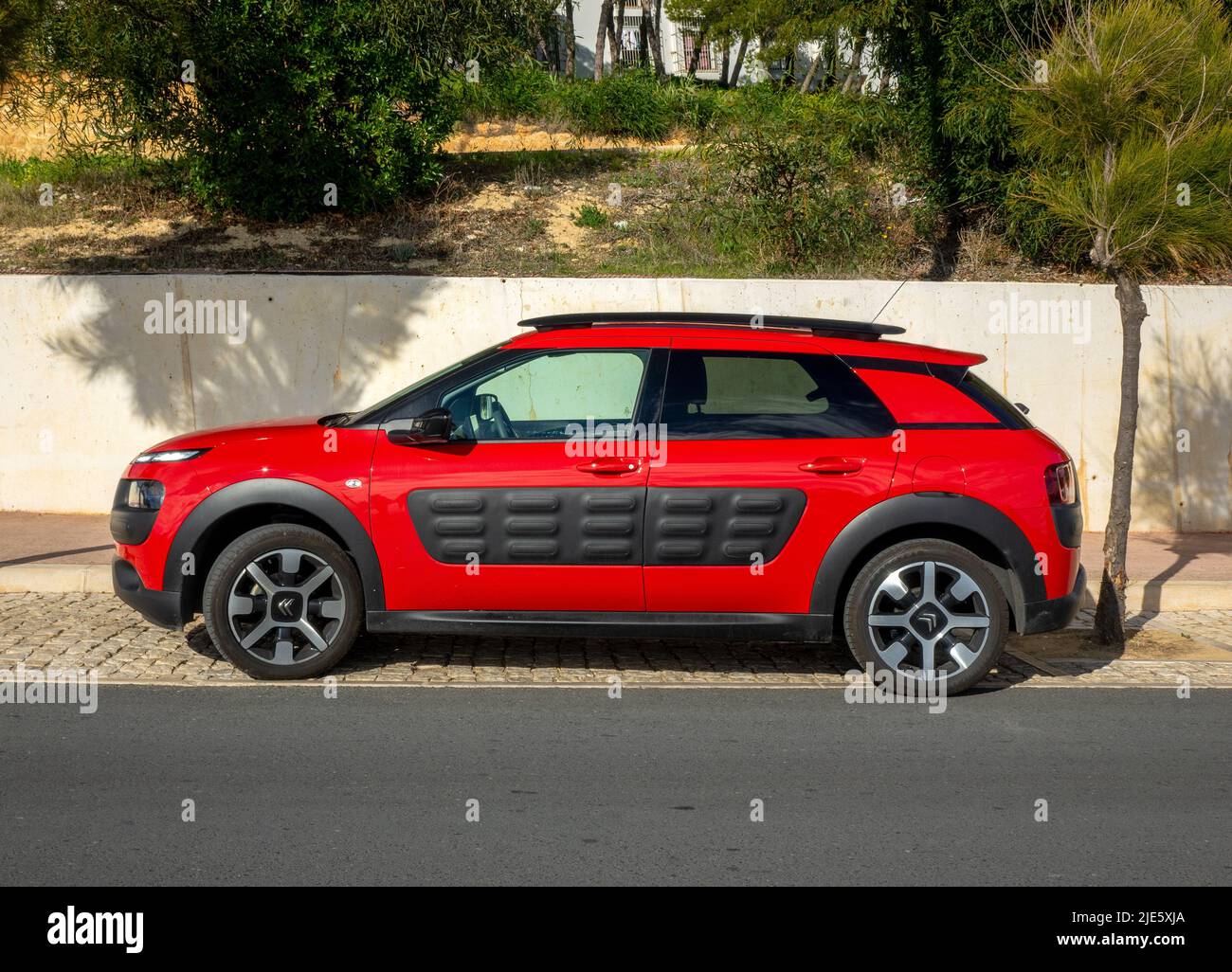 A Red Citroen C3 Car Parked On A Street In Albufeira Portugal Stock Photo