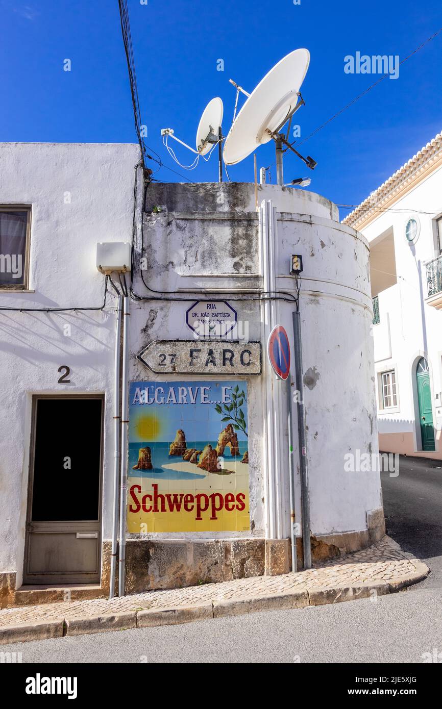 Vintage Schweppes Advertising Sign On Azulejos Ceramic Tiles In The Town Of Boliqueim On Rua Dr Joao Baptista Ramos Faisca The Algarve, Portugal Stock Photo