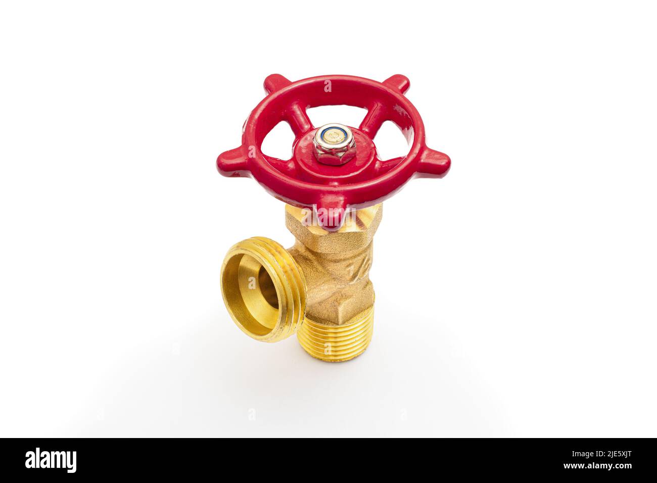 Brass water gate valve with red handwheel on white Stock Photo