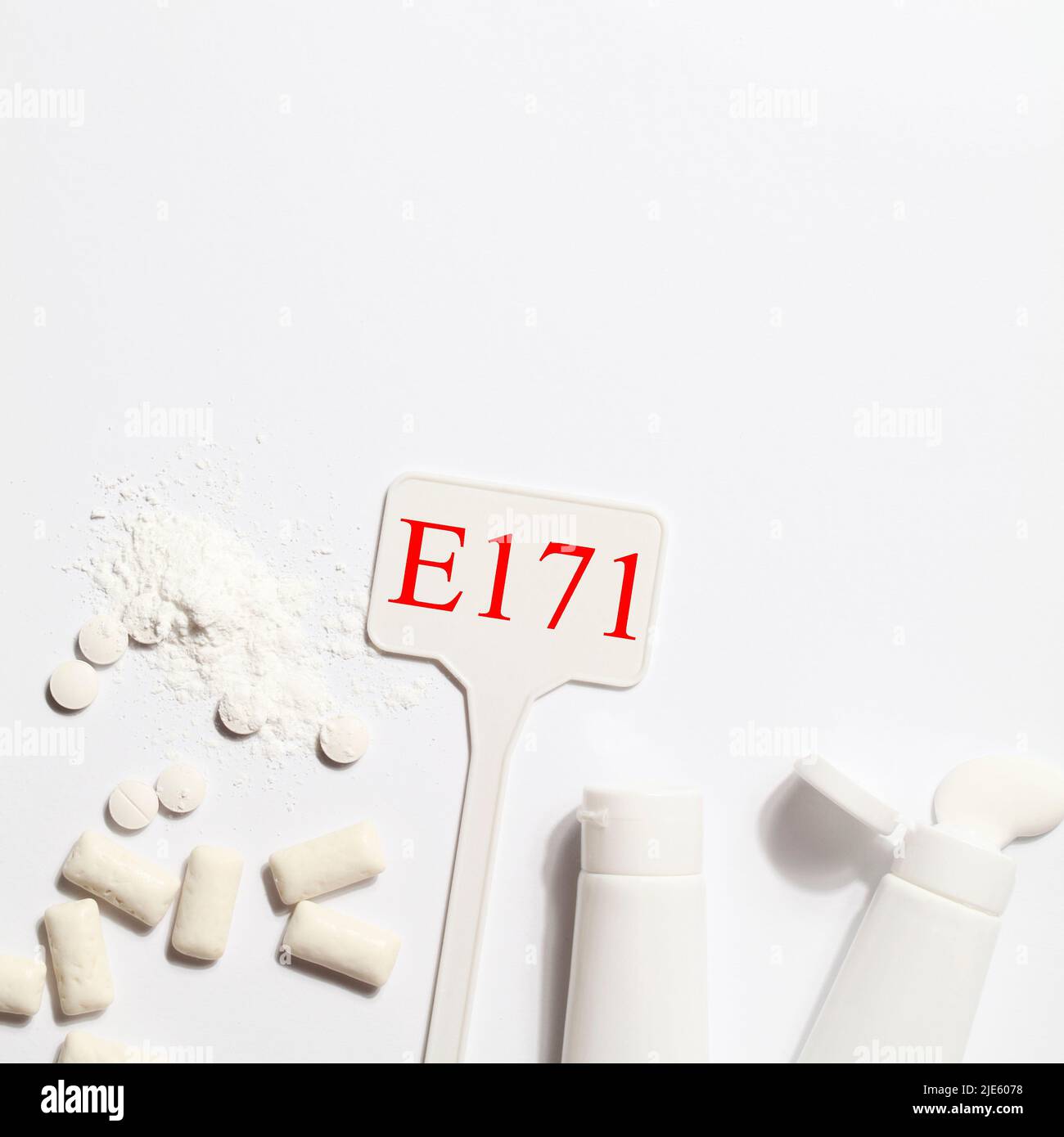 Titanium dioxide, E171, dangerous additive concept. gum, pills