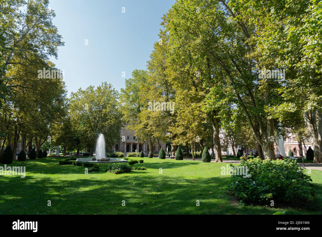 ZAGREB, CROATIA - JULY 29, 2021: People Relaxing On Summer Day In Zagreb Central Park Stock Photo