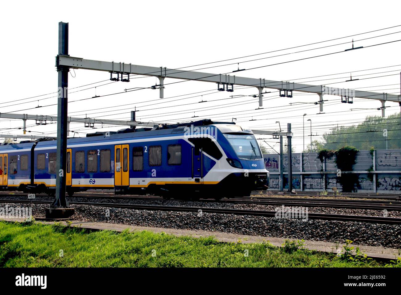 SNG CAF local commuter sprinter train at track in Barendrecht in the Netherlands Stock Photo