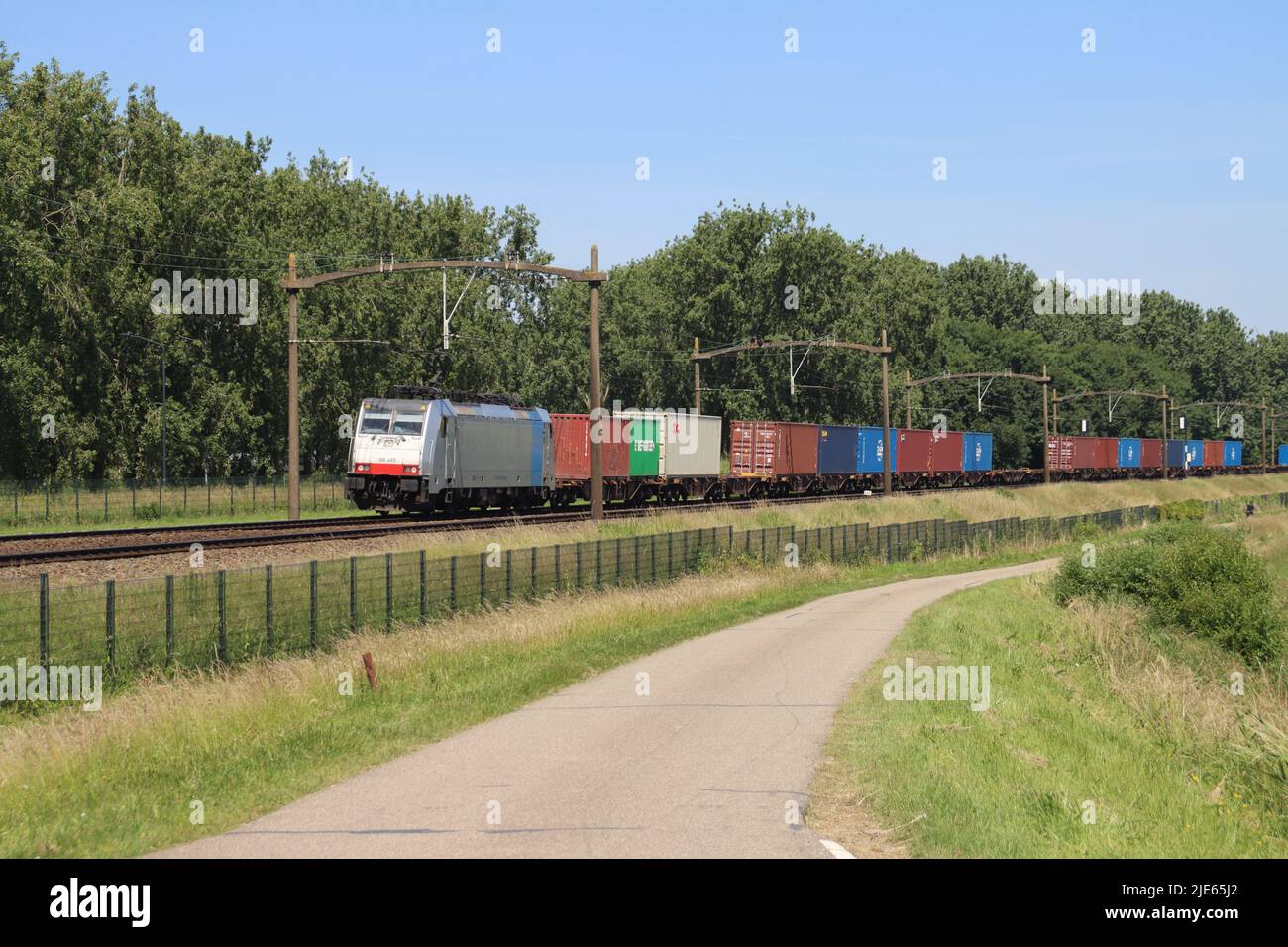 Traxx locomotive with container freight train on track close to Dordrecht   in the Netherlands Stock Photo