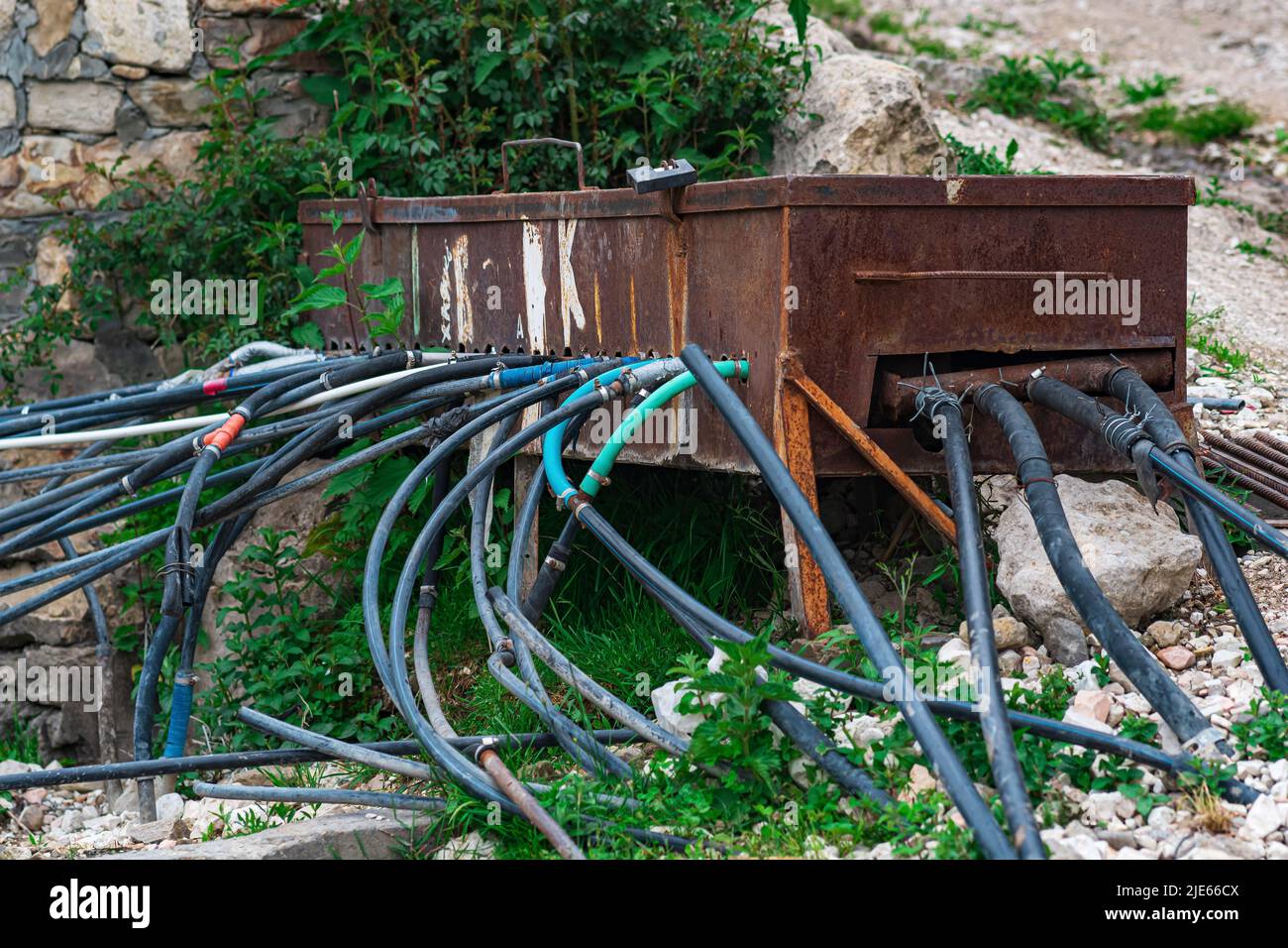 makeshift plumbing in a mountain village water from a spring enters