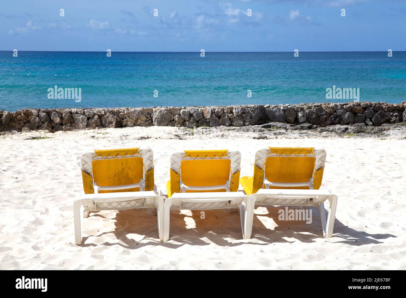 Tropical beach deck chairs hi-res stock photography and images - Alamy