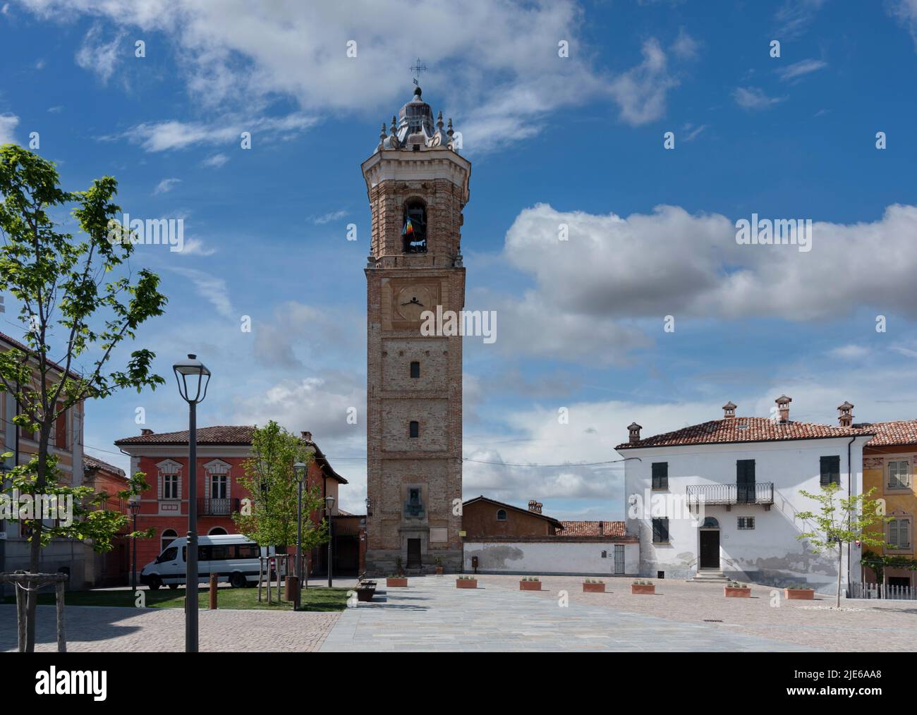 La Morra, Langhe, Piedmont, Italy: Castle square with the bell tower or civic tower (18th century) with clock, blue sky with clouds Stock Photo