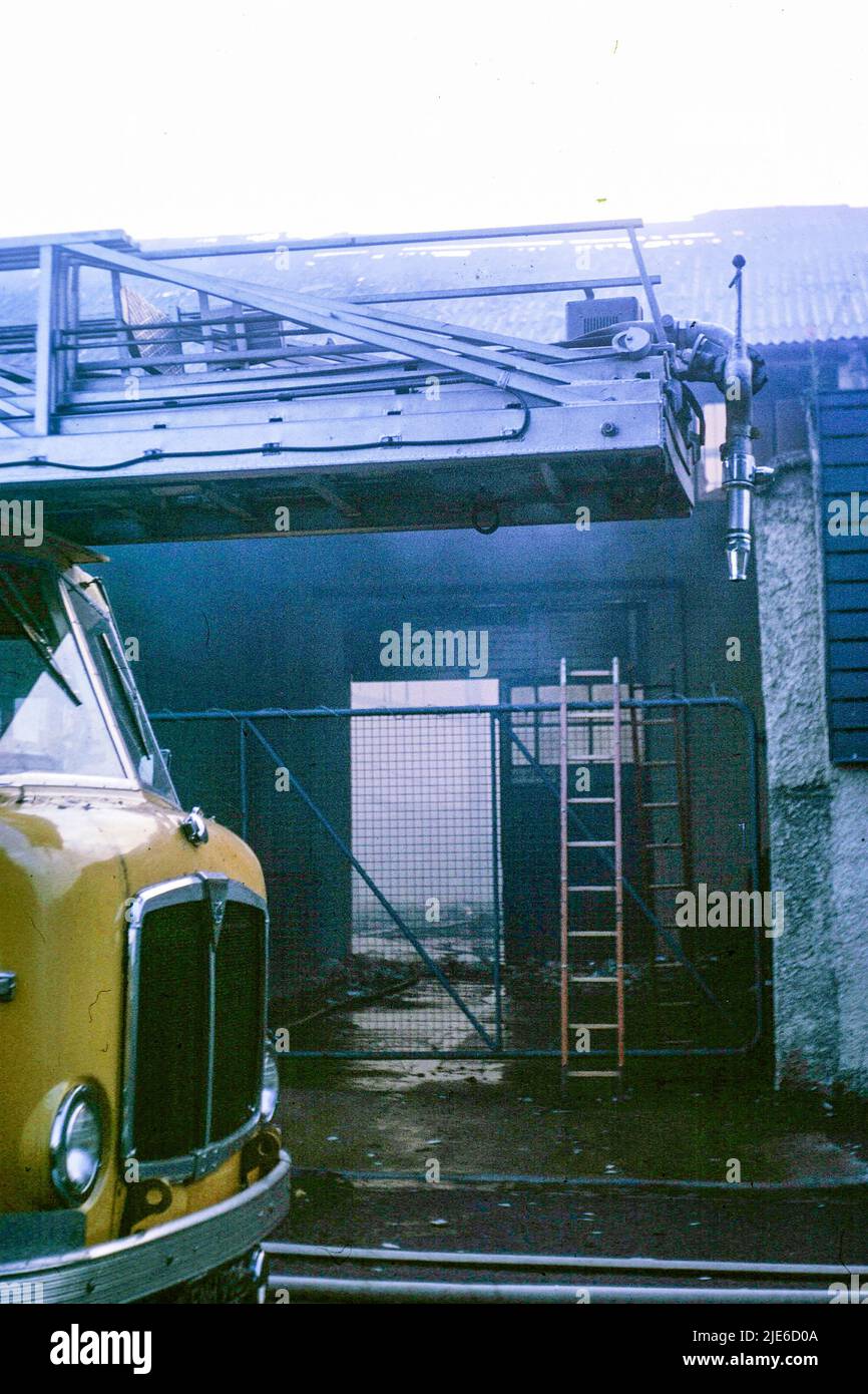A turntable ladder fire engine at the Dover Ltd fire in 1972 Stock Photo Alamy
