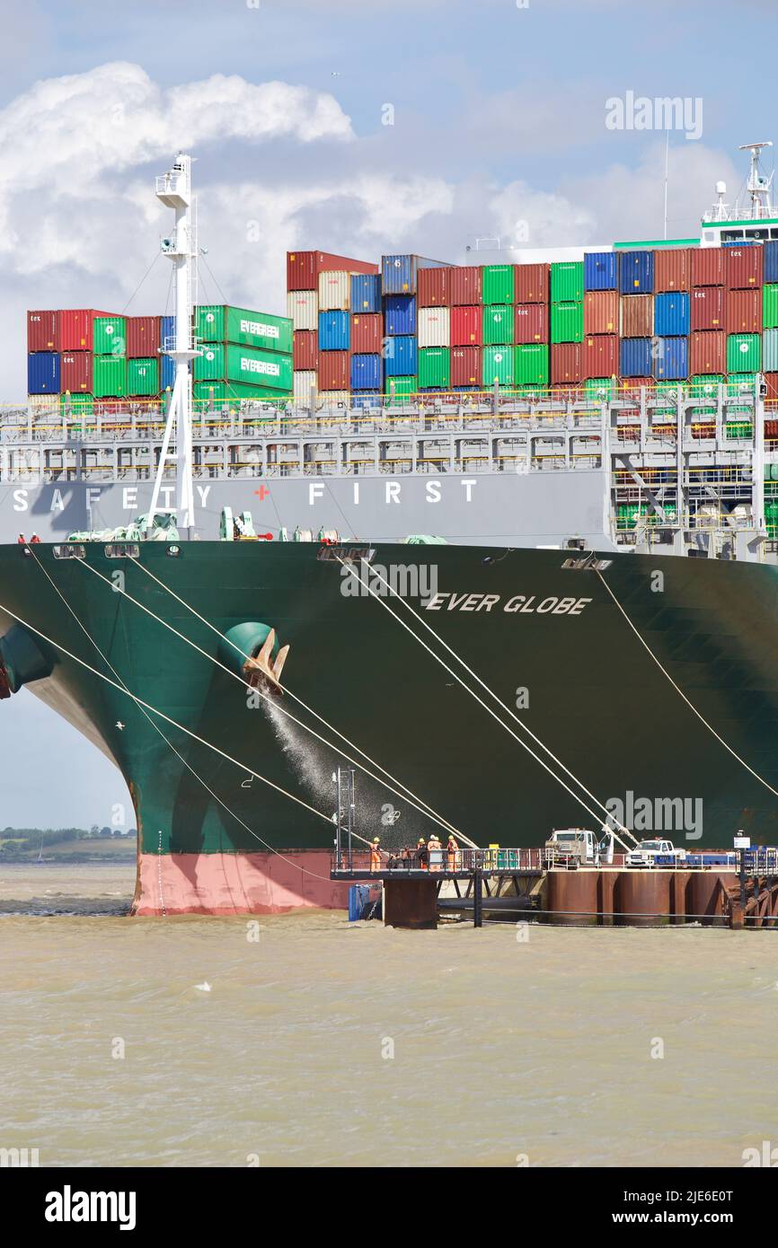 Evergreen Container ship Ever Globe docking at the Port of Felixstowe. Stock Photo