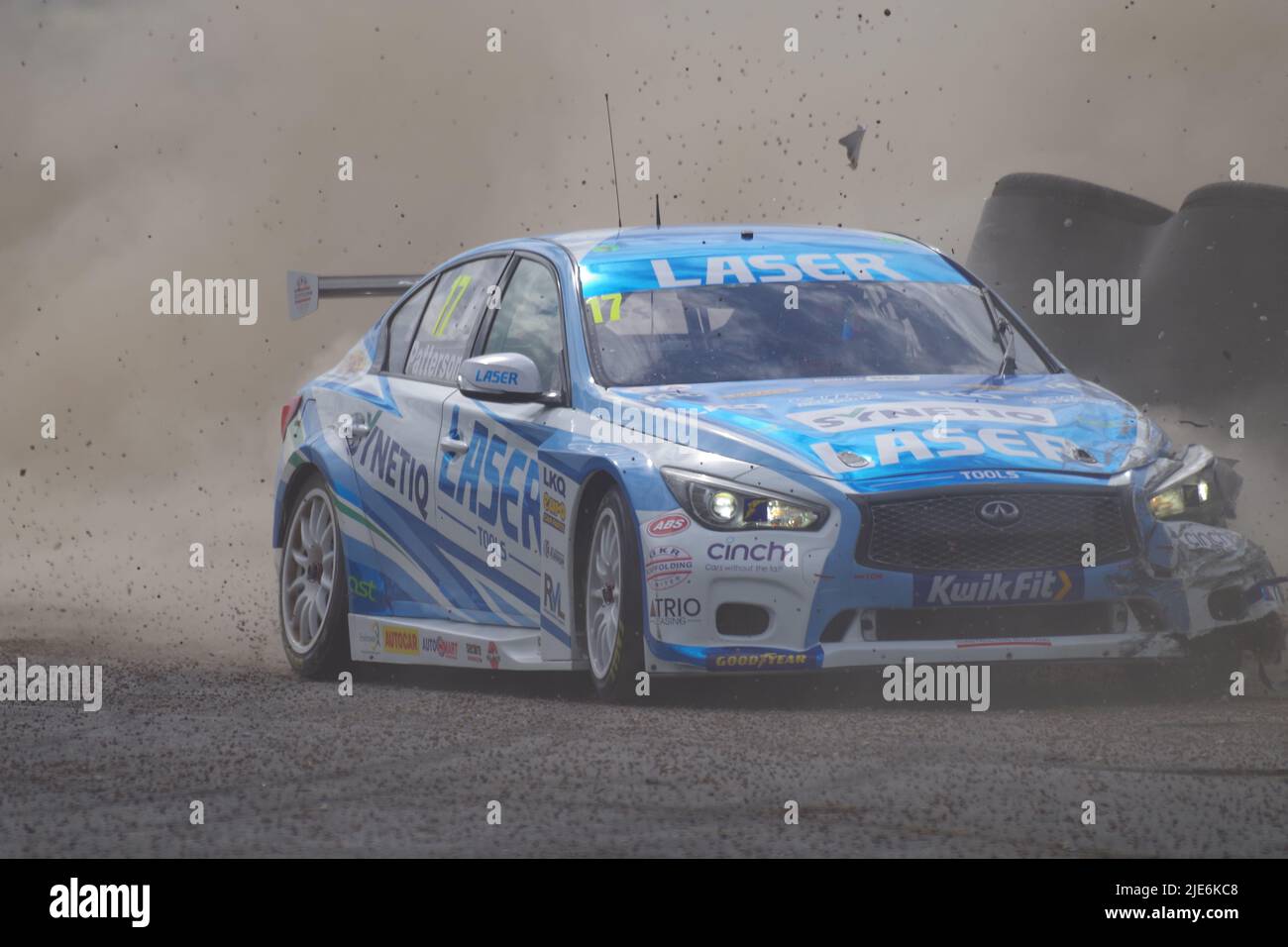Croft, England, 25 Jun 2022. Dexter Patterson driving an Infiniti for Q50 Laser Tools Racing crashing through the gravel trap during qualifying in the Kwik Fit British Touring Car Championship. Credit: Colin Edwards/Alamy Live News. Stock Photo