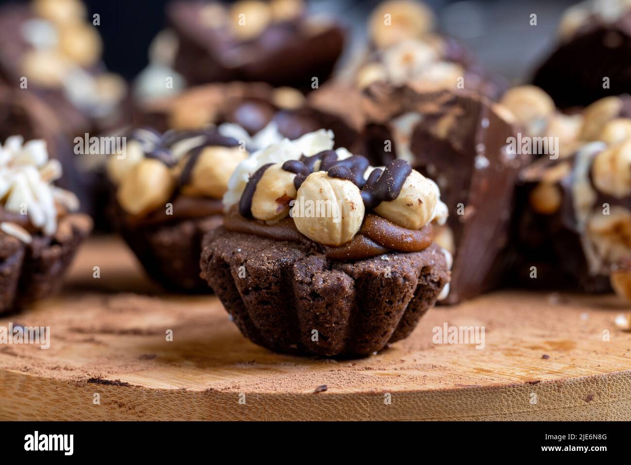 cake made of caramel and nuts in chocolate, mixed