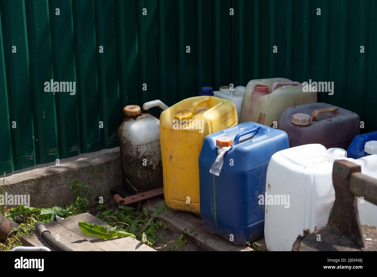 Old fuel canisters. Stocks of diesel fuel and gasoline in the period of deficit. Stock Photo