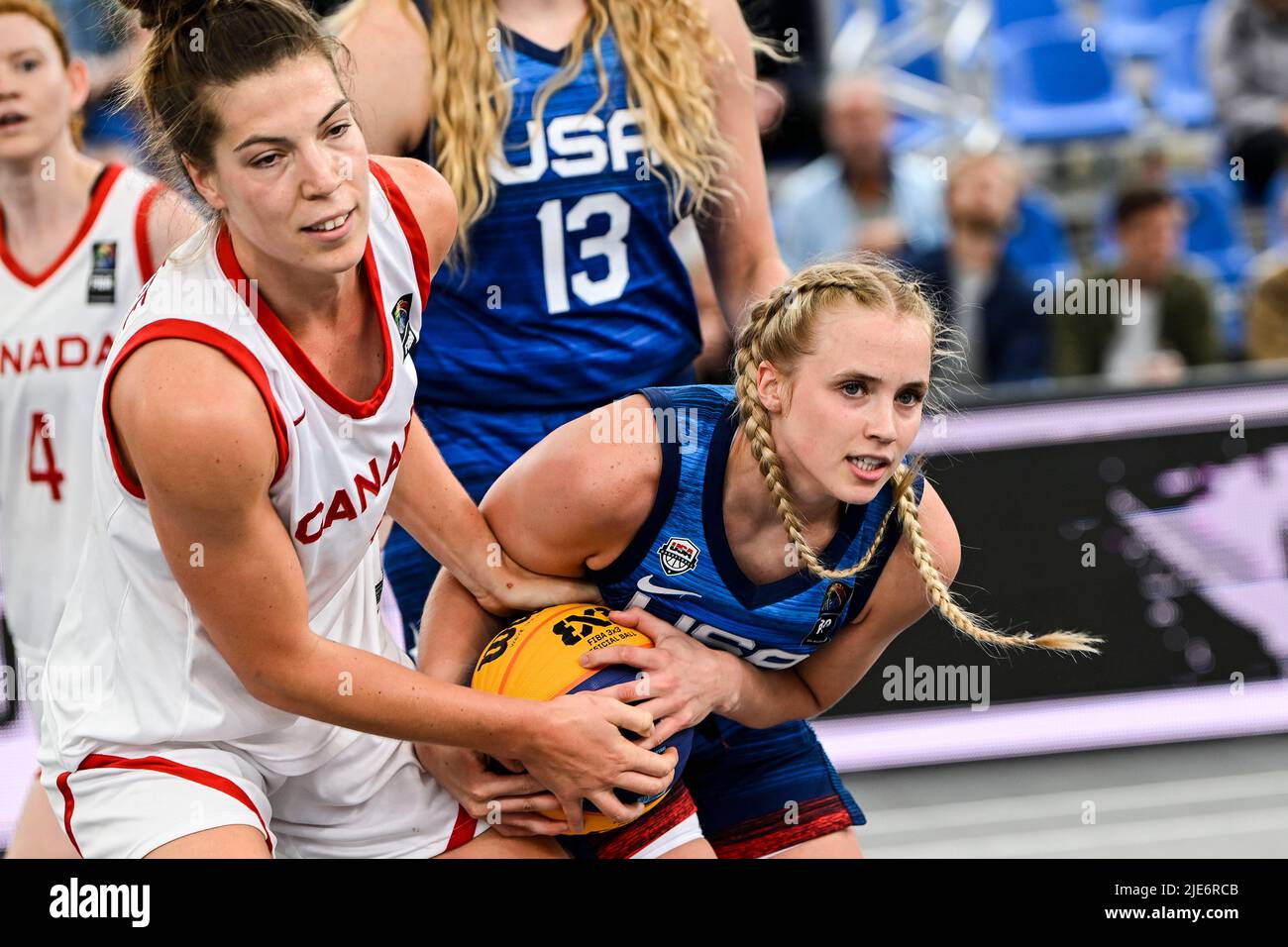 Canada's Michelle Plouffe and US' Hailey Van Lith fight for the ball during a 3x3 basketball game between Canada and the United States of America, in the Women's quarter final round at the FIBA 2022 world cup, Saturday 25 June 2022, in Antwerp. The FIBA 3x3 Basket World Cup 2022 takes place from 21 to 26 June in Antwerp. BELGA PHOTO TOM GOYVAERTS Stock Photo
