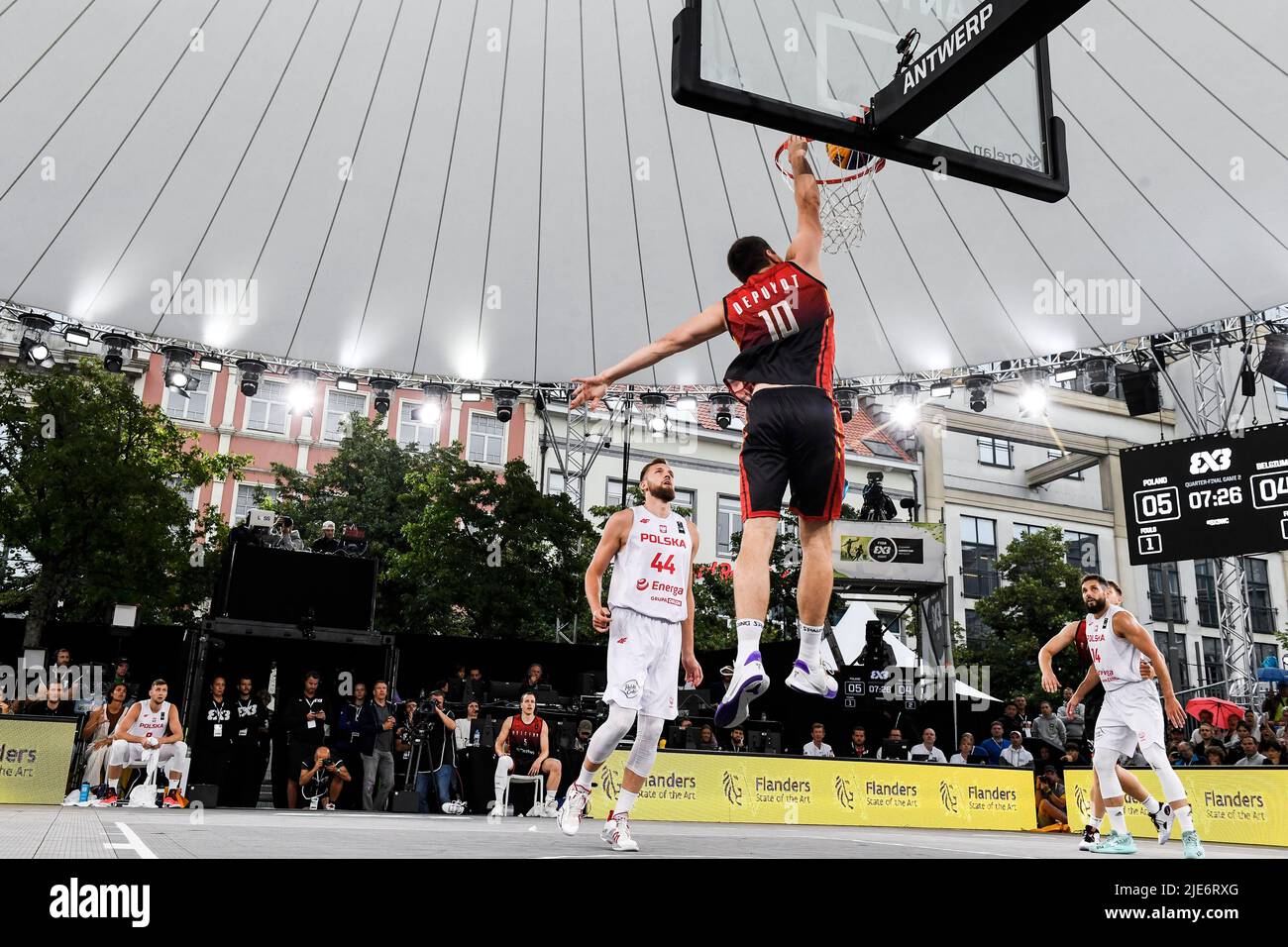 Belgium's Maxime Depuydt scores a dunk during a 3x3 basketball game between  Belgium and Poland, in the men's quarter final at the FIBA 2022 world cup,  on Saturday 25 June 2022, in