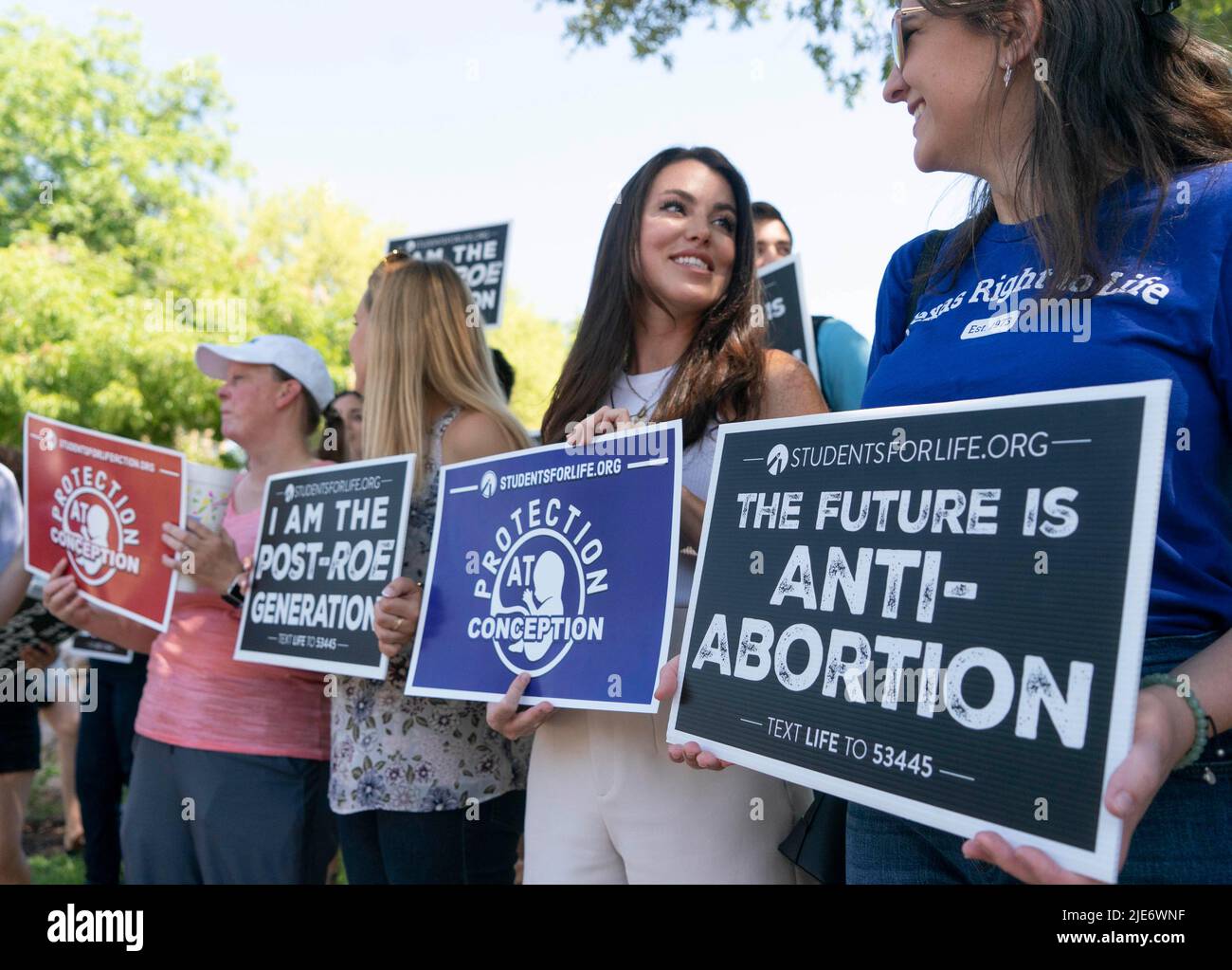 Austin Texas USA, June 25 2022: Chelsey Youman, c, of Human Coalition Action, speaks with Samantha Farnsworth, r, of Texas Right to Life as a dozen members of pro-life groups gather at the Texas Capitol to celebrate the U.S. Supreme Court decision overturning Roe v. Wade and federal protection for abortions. Credit: Bob Daemmrich/Alamy Live News Stock Photo