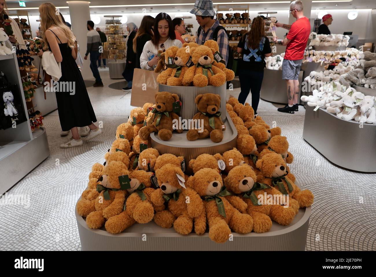 Harrods luxury store booming with customers again since Covid- 19 restrictions ended Louis XIII alcoholic beverages selling for thousands of pounds for those with deep pockets it's left to mature for 100 years and has a very distinctive taste like no other , and Harrods bears & soft toys are flying off the shelves now even the Harrods Christmas-2022 Bears are available and been bought now in June 6 months before Christmas .  the cuddly companion makes a wonderful souvenir from the world famous department store and Harrods bears and soft toys have become somewhat of an institution . Stock Photo