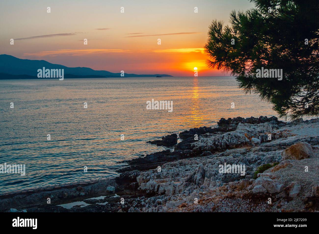 Beautiful landscape - beach on sunset - pink sky and sunlight ...